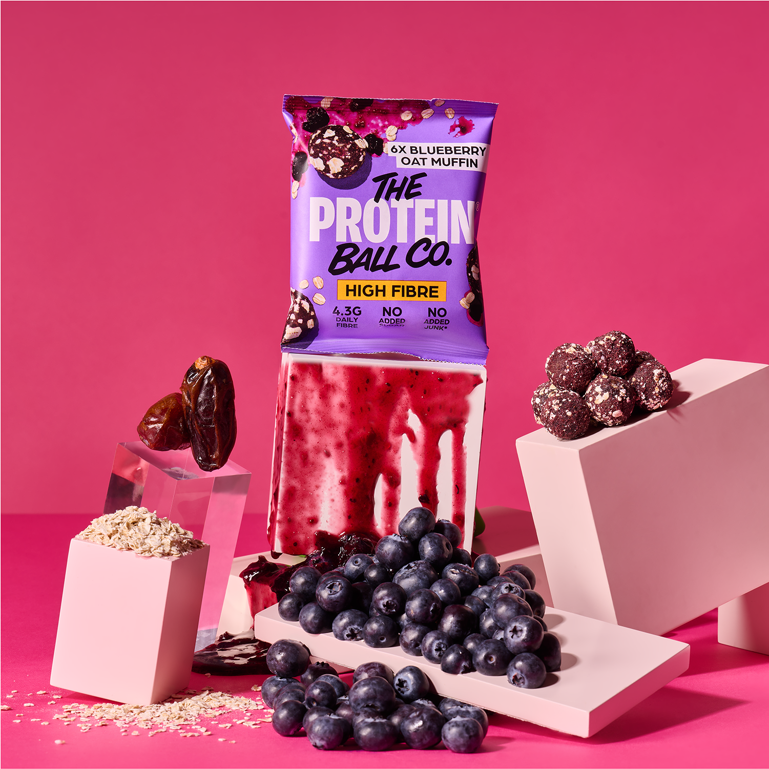High fibre range The Protein Ball Co blueberry oat muffin bag with berries and balls